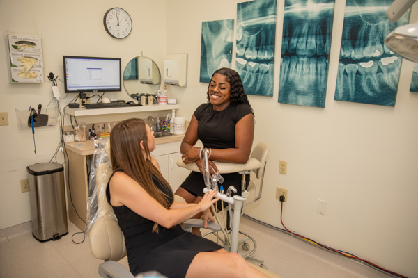Patient receiving periodontal care at Dr. Friedberg & Associates dental office in Houston