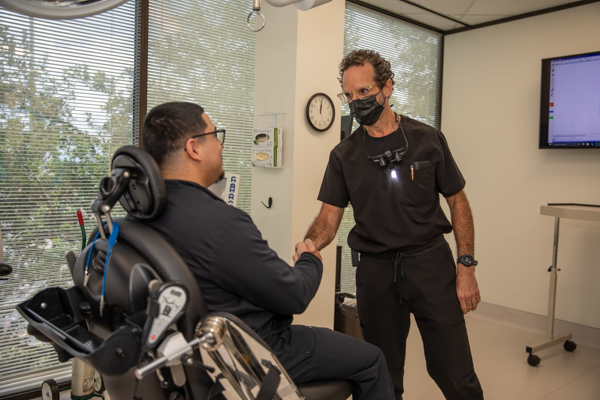 Dr. J. Robert Friedberg, board-certified periodontist and dental implant specialist in Houston