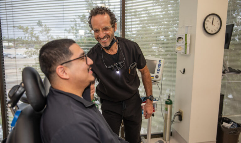Consultation with dental implants Houston periodontist