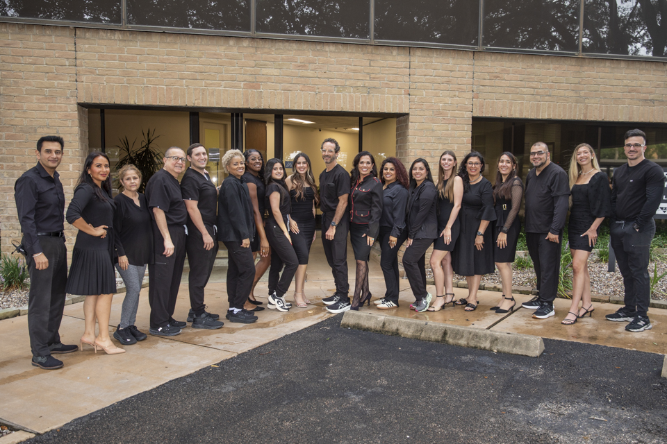 Dr. Robert Friedberg and team at dental office in Houston