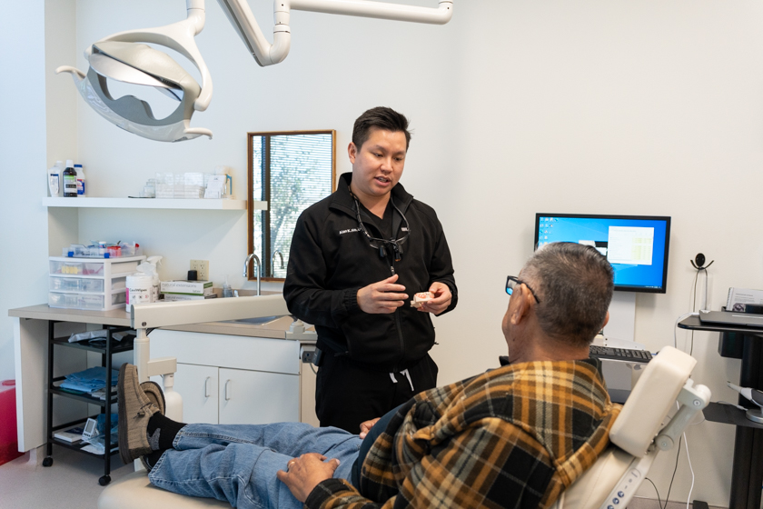 Dental implant cost Houston discussion at Dr. Friedberg & Associates