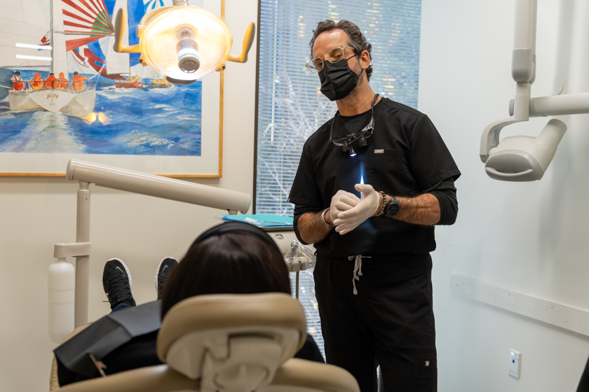 Dr. Friedberg consulting patient about full-arch dental implants
